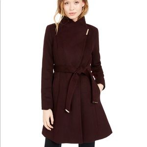 Michael Kors Asymmetrical belted coat.